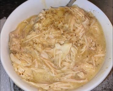 Shredded chicken gravy on mashed potatoes